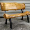 Log love seat with saddle seat and back
